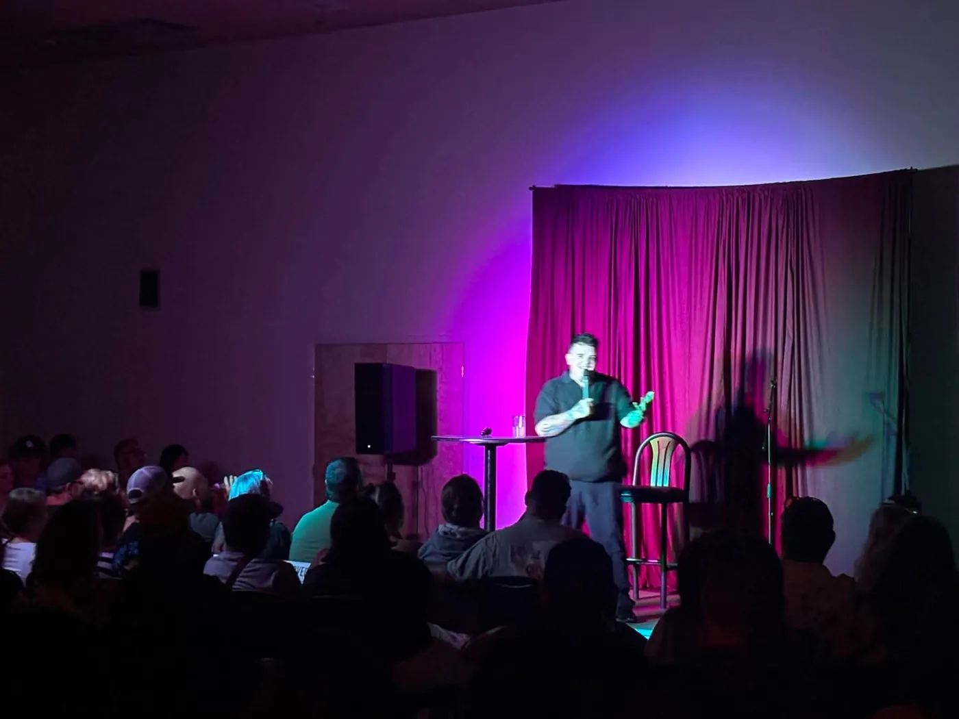 AJ Deleon on stage, Packed room